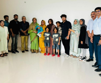 Our team with Dr.Sumera Syed Mohamed and family of apartment No. E 12 in Triton Crescent ,after handing over.