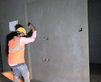 Internal wall plastering work is in progress on 1st floor.